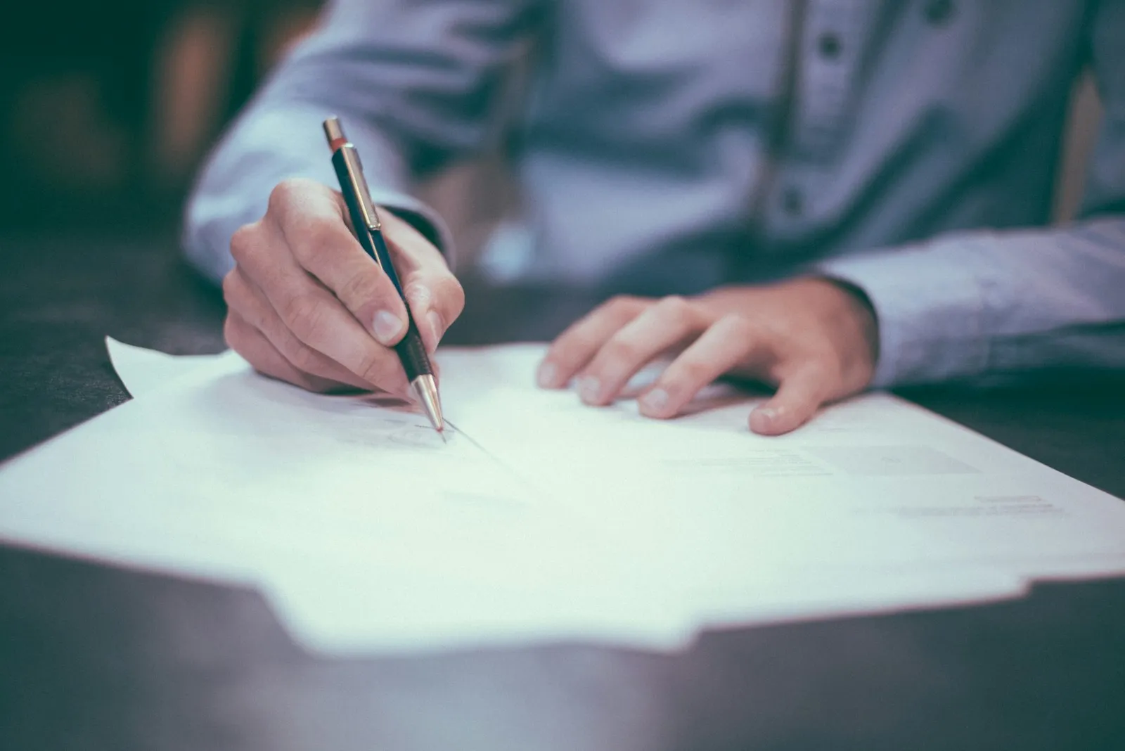 Researcher reviewing a manuscript